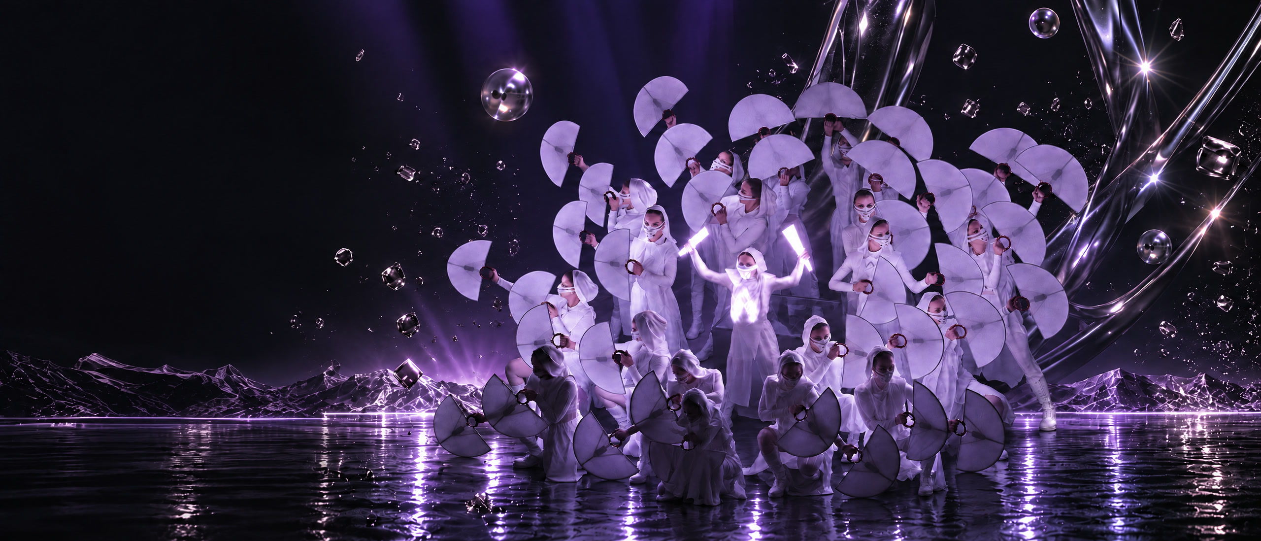 Performers in white hold a cloud of illuminated fans above dark reflective water
